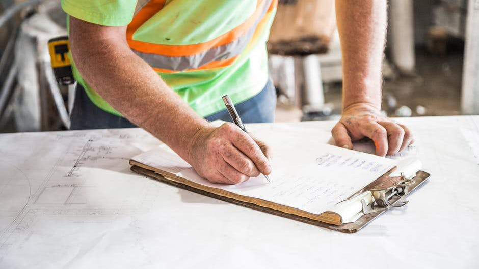 Man working wearing a high visibility shirt