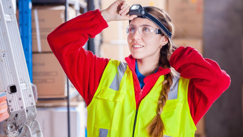 Woman wearing a high visibility safety vest